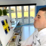 Mouth Artist, Henry Fraser paints